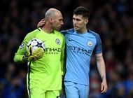 MANCHESTER, ENGLAND - FEBRUARY 21:  John Stones of Manchester City talks with Willy Caballero during the UEFA Champions League Round of 16 first leg match between Manchester City FC and AS Monaco at Etihad Stadium on February 21, 2017 in Manchester, United Kingdom.  (Photo by Laurence Griffiths/Getty Images)